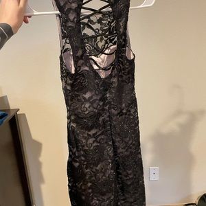 Size 1 black Lacey dress with attached nude color slip underneath!